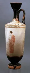 Attic white-ground lekythos decorated with a youth dressed in a grey himation, from Laurium, Attica, c.450-425 BC